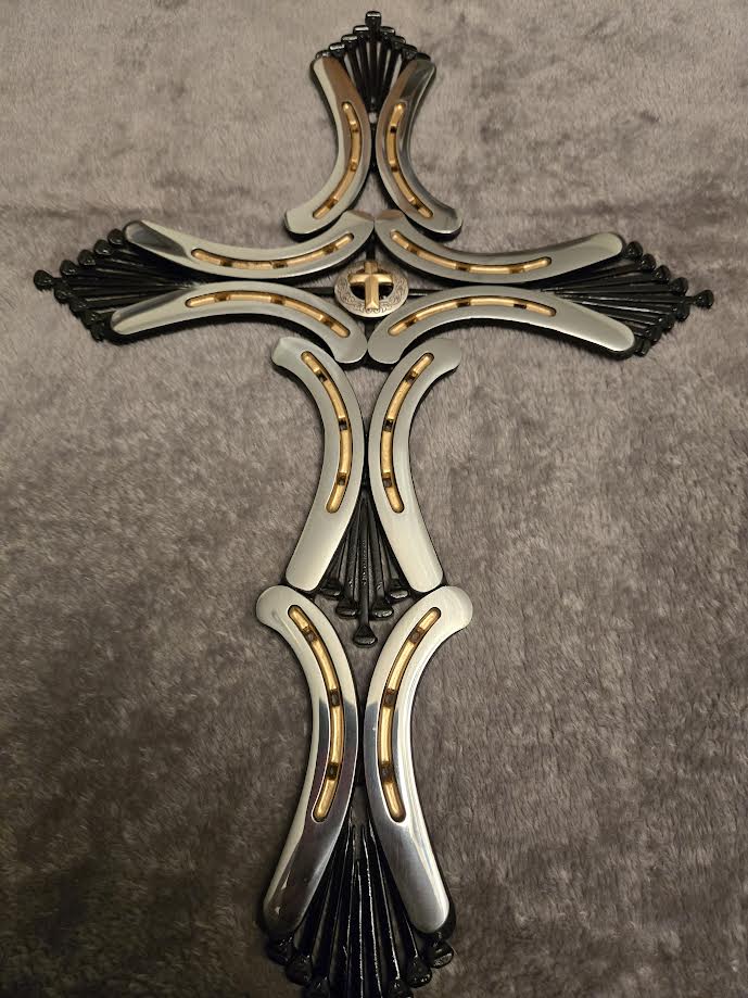 Black and gold pony cross