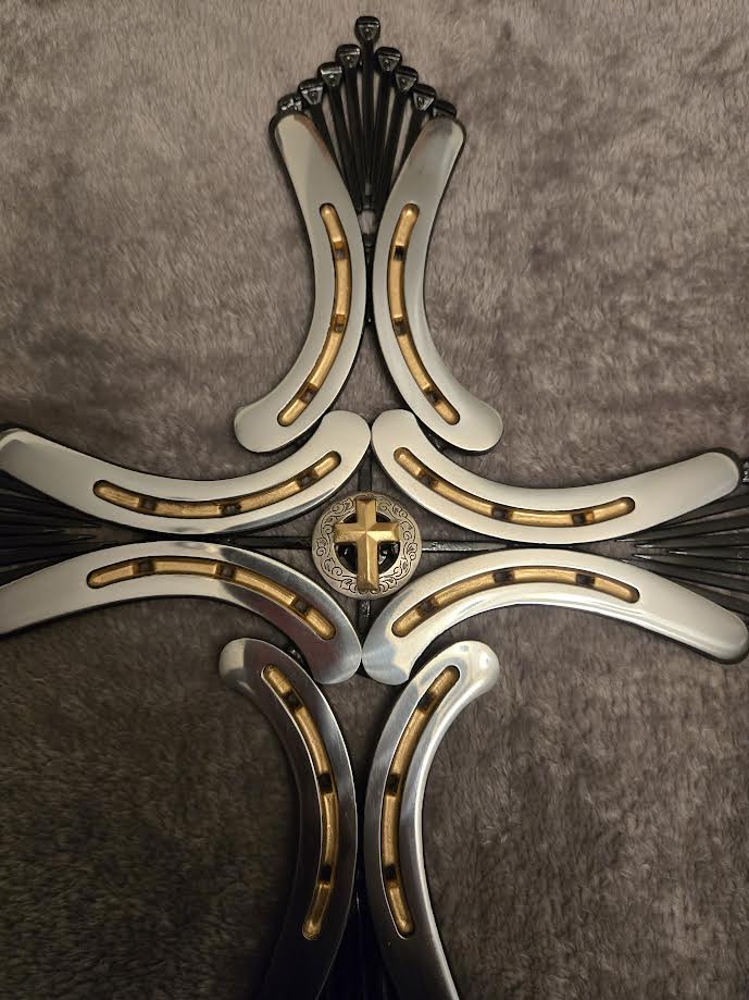 Black and gold pony cross